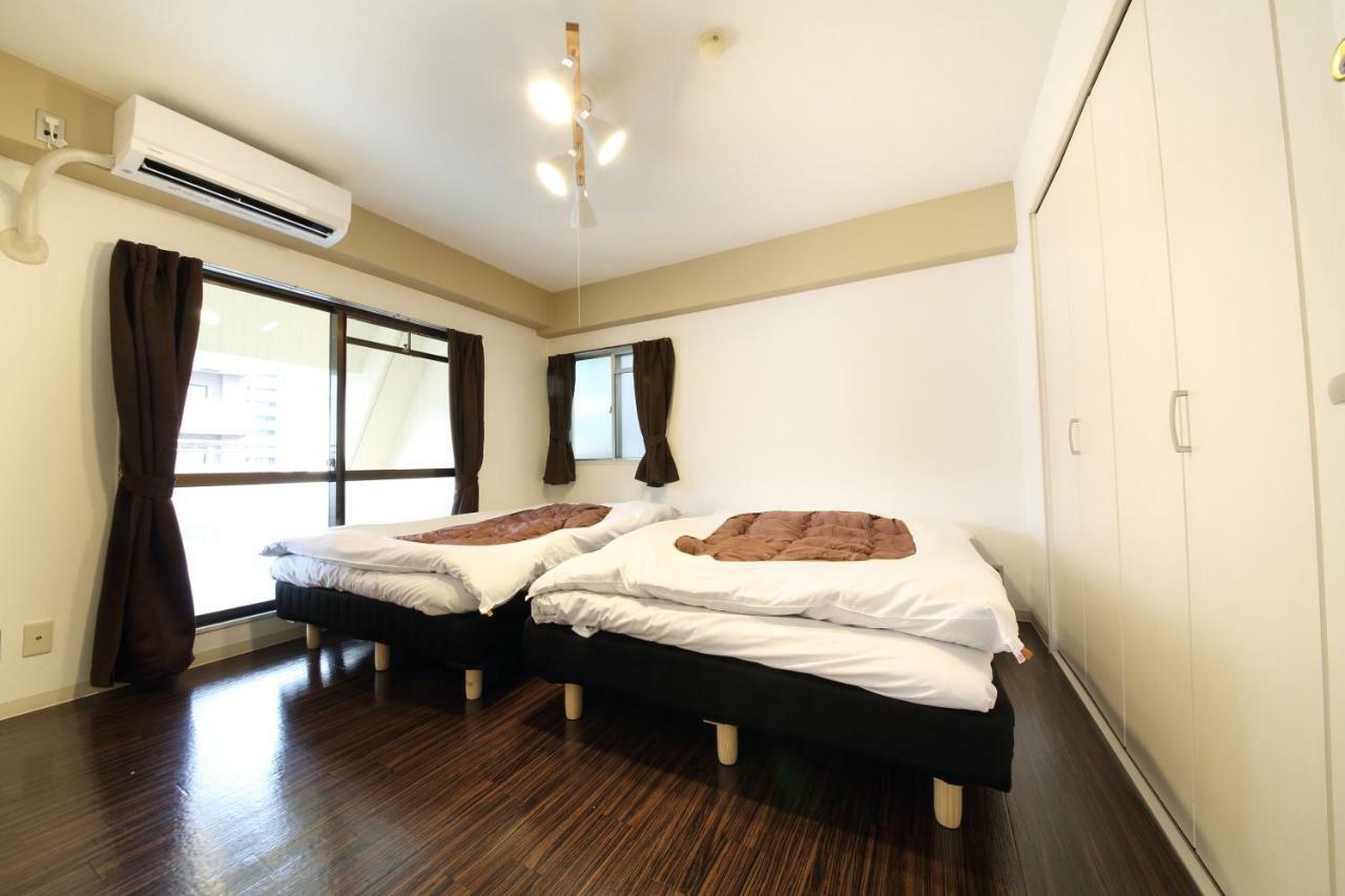 Appartement avec 1 chambre Ōsaka Extérieur photo